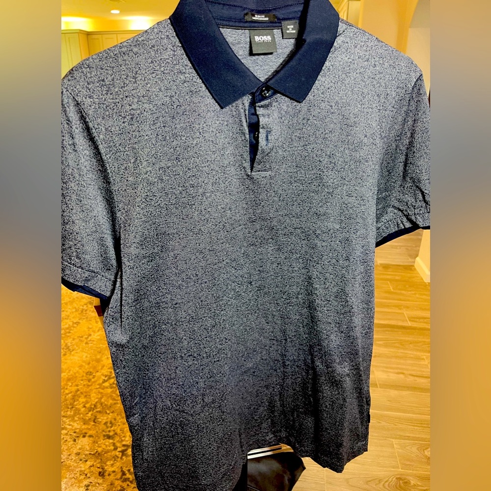 Boss polos size L. In great condition barely worn.